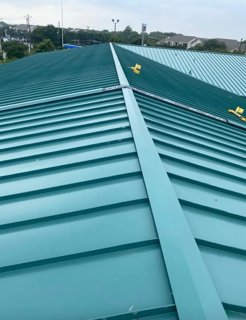 Green commercial metal roof ridge and valley for Metal Roof Repair in South Bradenton